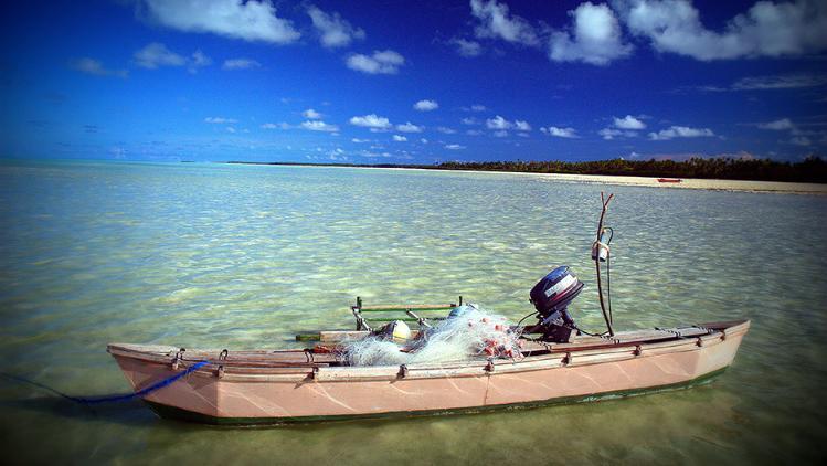 A fishing boat on a pacific island