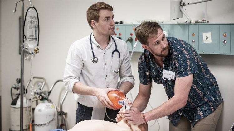 Two Doctor of Medicine students in a simulated laboratory