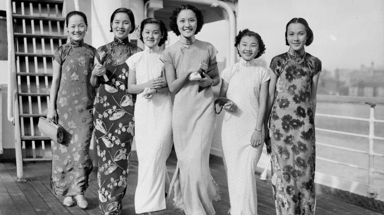 A group of Chinese women smiling at the camera