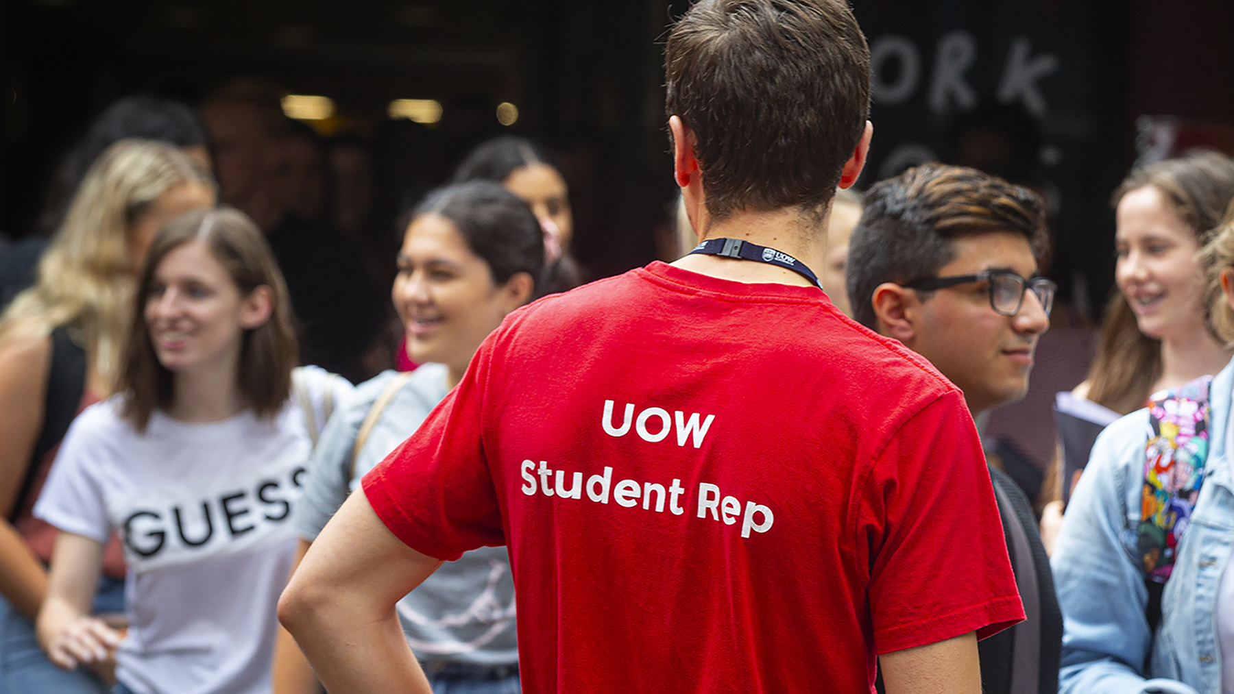 A UOW student rep guides new students at an event on campus