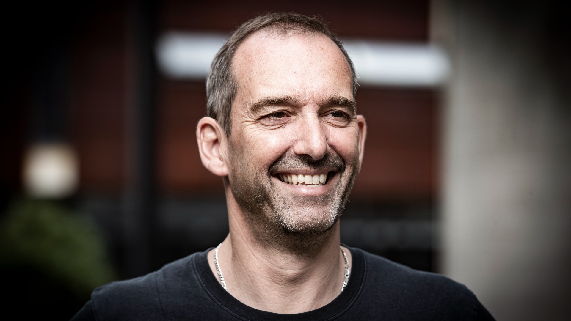 Professor Marc in het Panhuis smiles at the camera. He wears a black shirt. Photo: Paul Jones