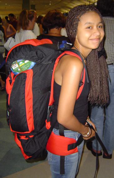 Ngamta (Natalie) Thamwattana at Auckland airport with her
              backpack