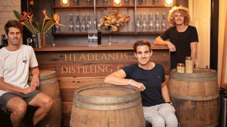 Three males at the Headlands Distillery 