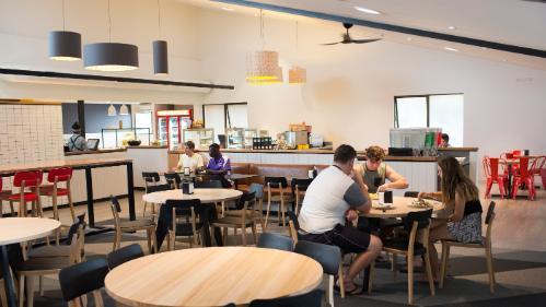 Campus East dining room with students eating meals