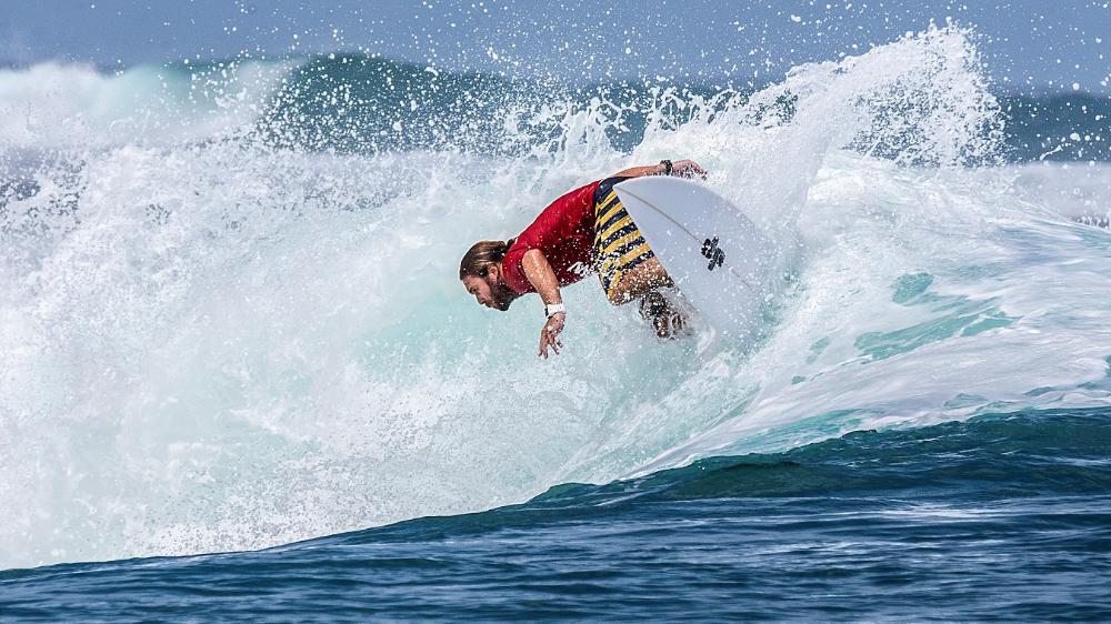 Geoff Latimer surfing