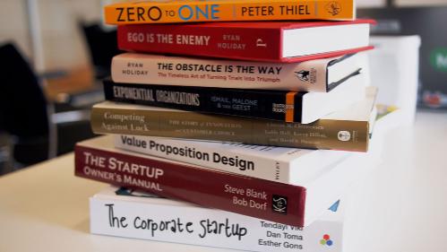 Stack of books about starting a business