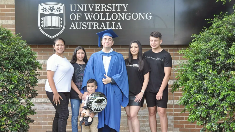 Nicholas and his family at graduation
