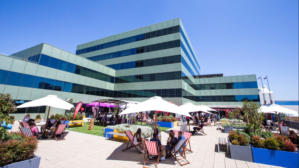 students sitting outdoors at the south western sydney campus