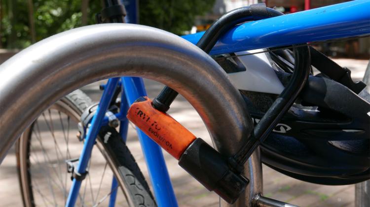 A bike secured with a D-lock