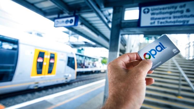 person holding a concession opal card at North Wollongong train station
