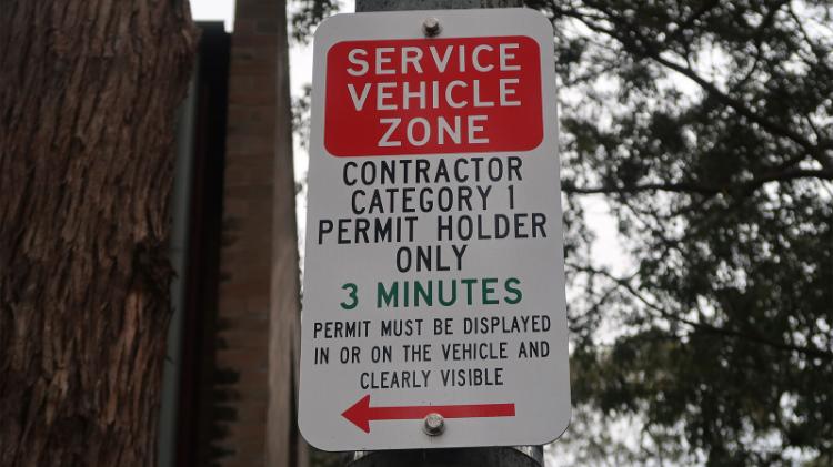 Service vehicle parking sign