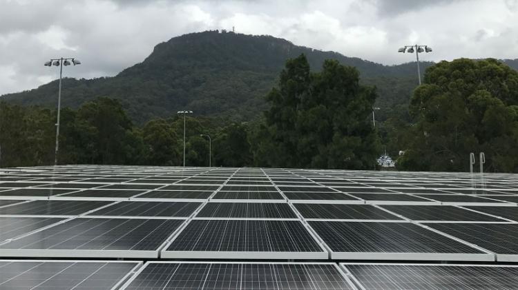 Solar panels at Wollongong Campus with view of Mount Keira