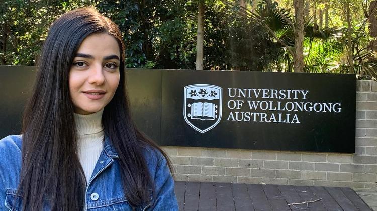 Maedeh Motalebi with the UOW sign in the background