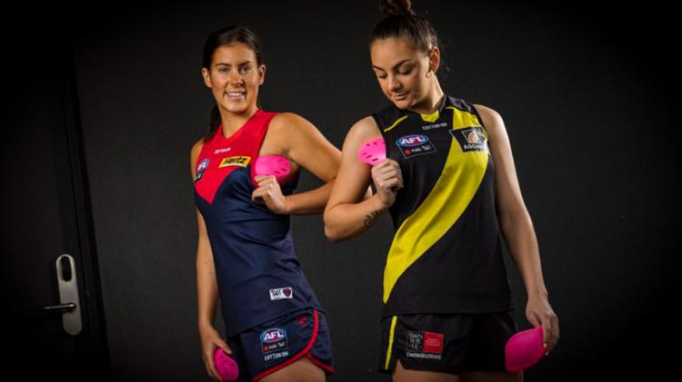 Womens AFL players promoting Breast Armour