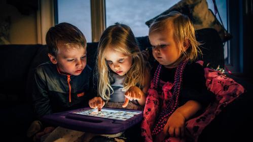 Photo of Children watching tablet computer