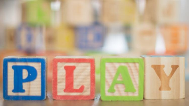 Children's stacking blocks spelling out 