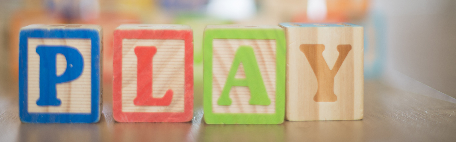 Play spelled out in kids blocks