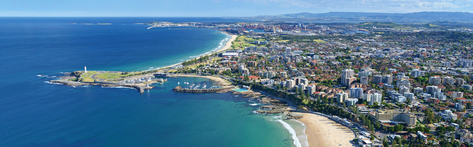 Aerial shot of the Illawarra, showing from the harbour to the escarpment