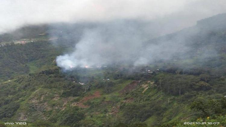 Villages in West Papua after air strikes. Smoke billowing from village