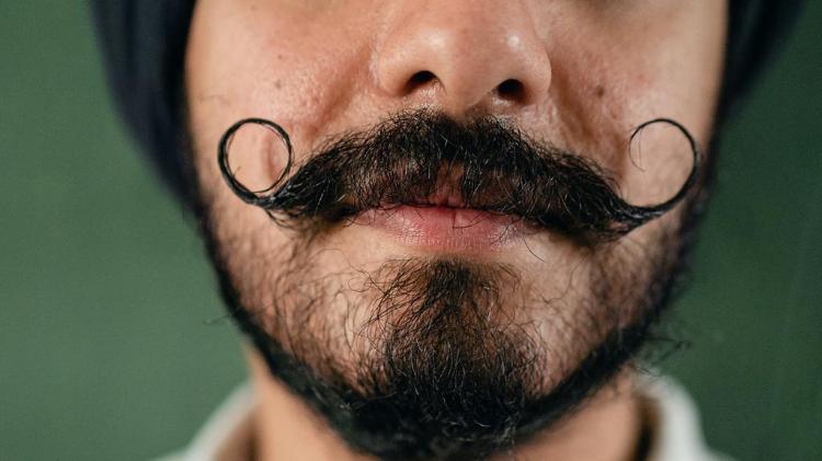 Close up of man with glorious moustache