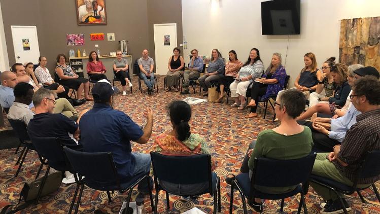 Photograph of UOW staff members participating in a yarning circle