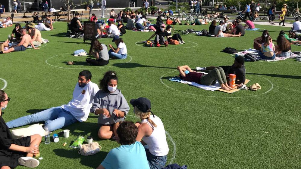 Social distancing measures in place in Domino Park, Brooklyn.