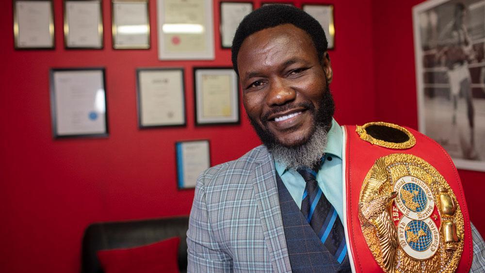 Lovemore Ndou posing with his title belt