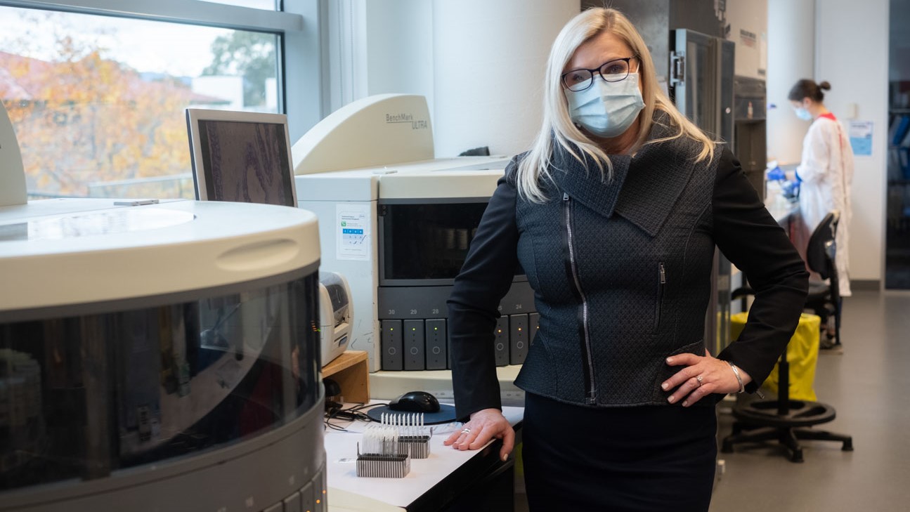 Liesel in pathology lab with mask on testing samples