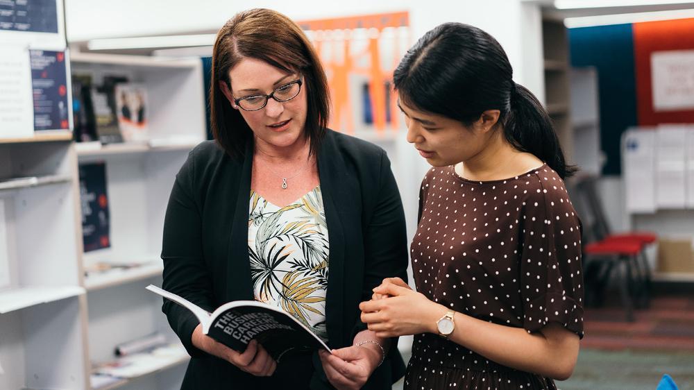 A UOW careers counsellor talks to a student