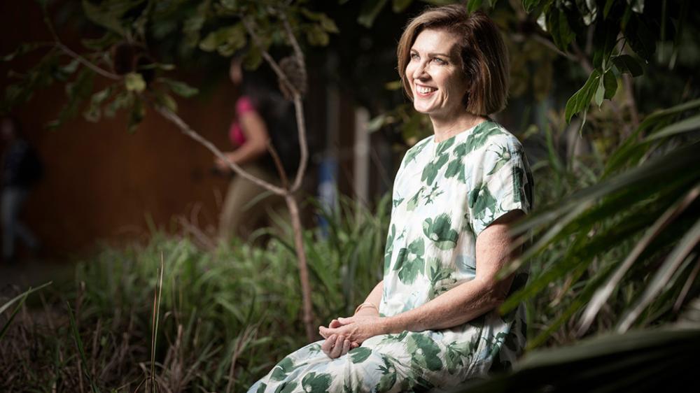 Lyn Cronin sitting under a tree