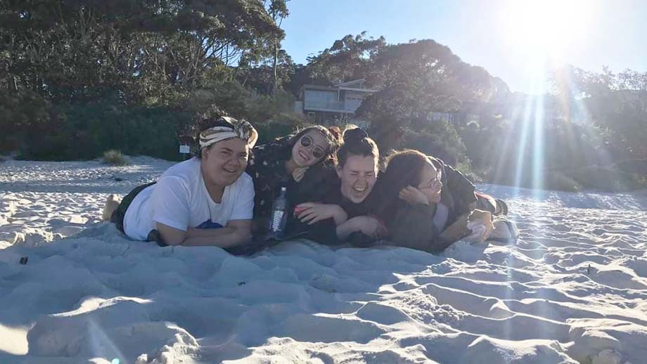 Group of girl friends on the beach