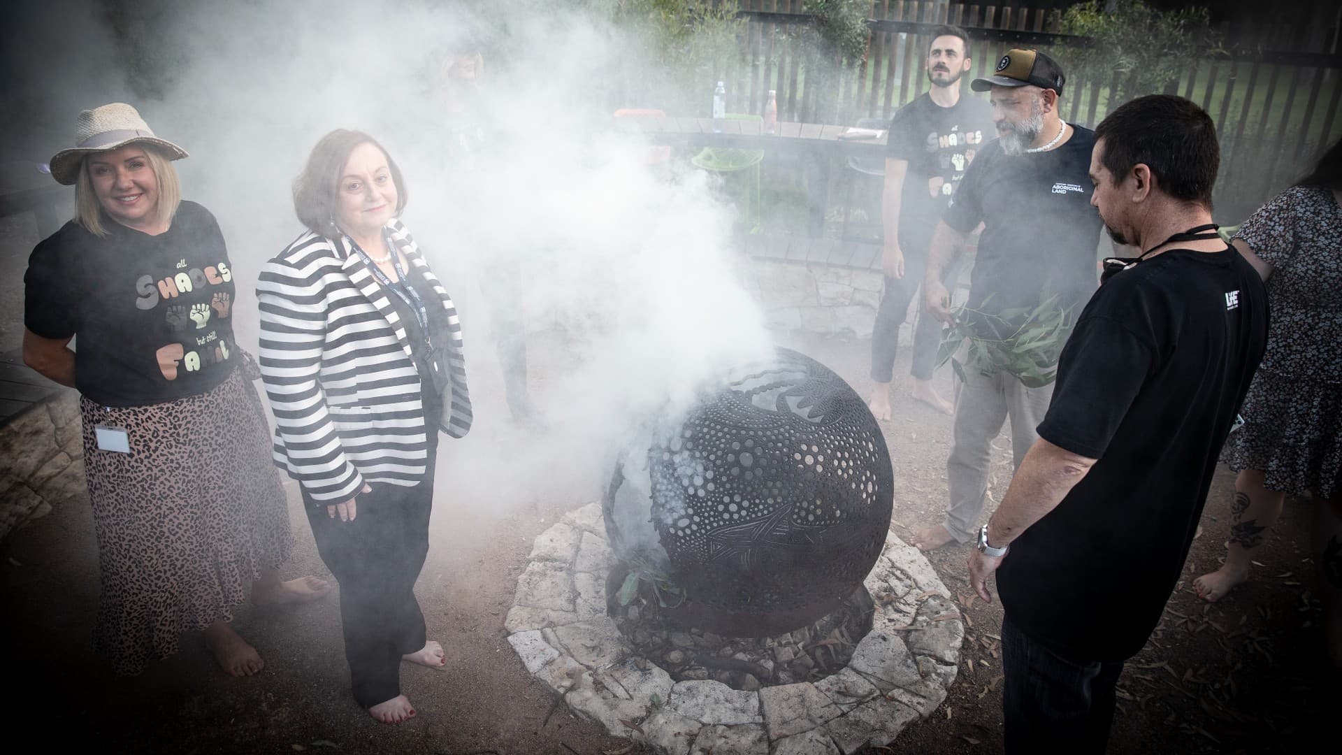 Professor Patricia Davidson takes part in a smoking ceremony at Woolyungah Indigenous Centre to welcome her to UOW. Photo: Paul Jones