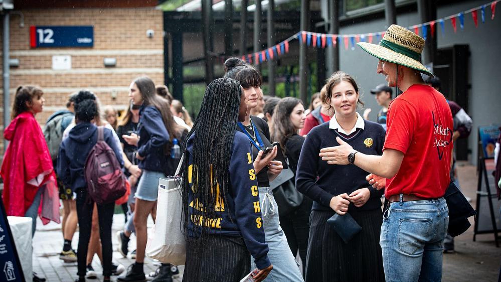 Students chat to a UOW staff member during a Discovery Day event. Photo: Paul Jones