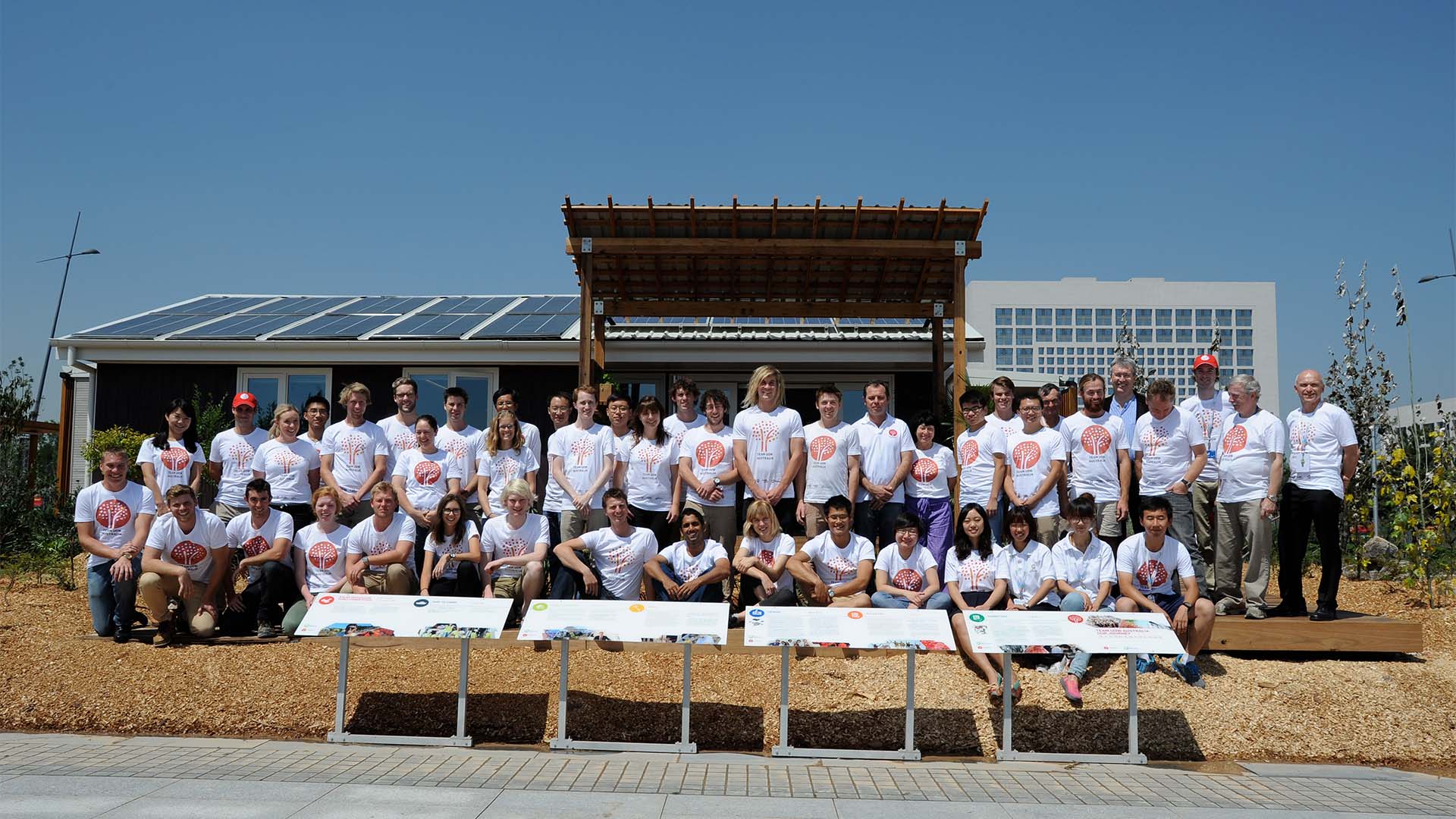 Team UOW Australia pose in front of the Illawarra Flame House in China