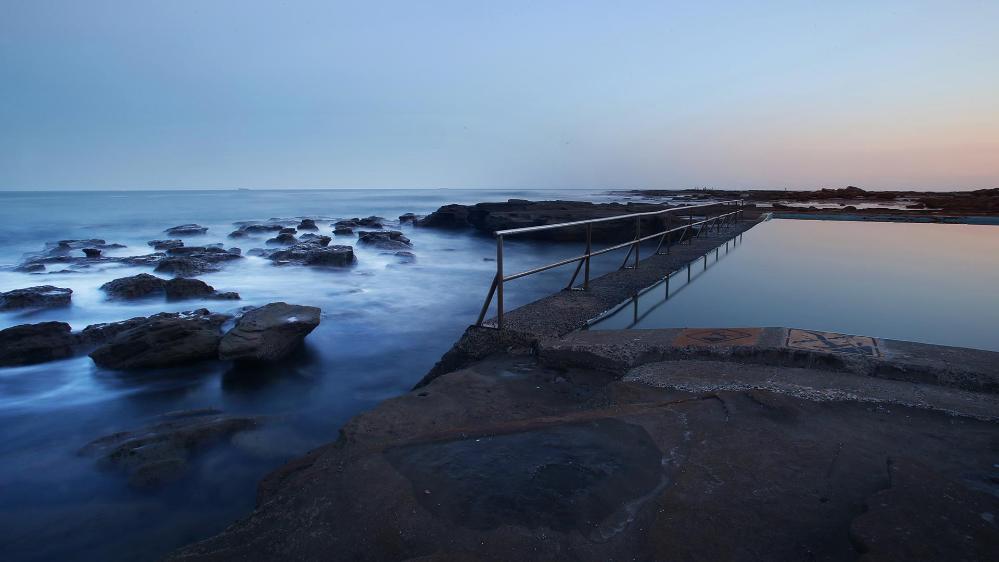 Pools of the Illawarra with flowing steam