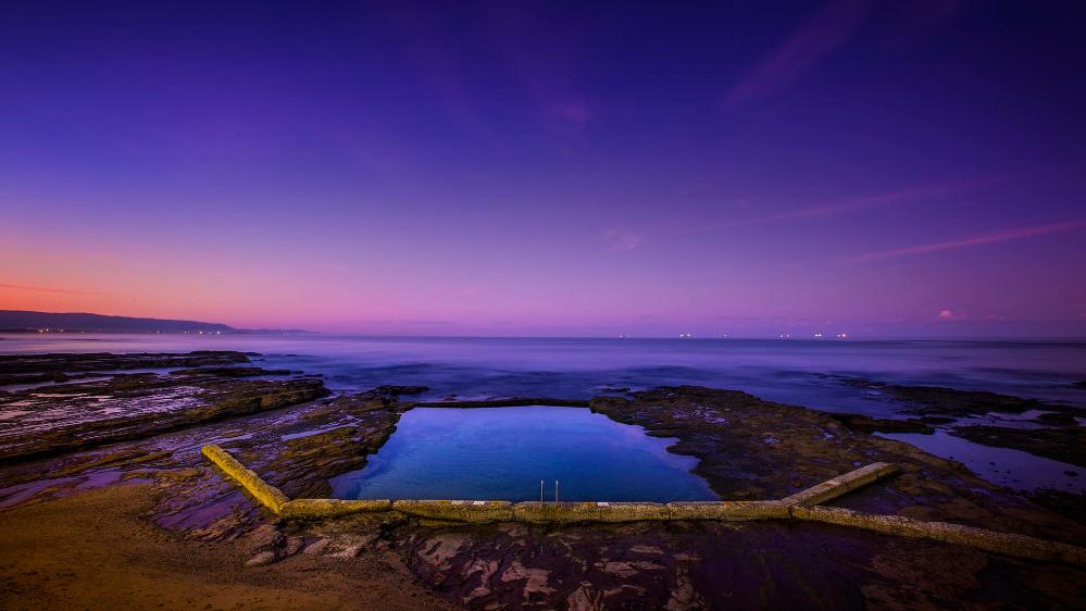 Pools of the Illawarra with purple sky