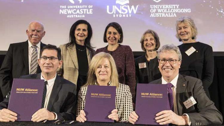 Formal NUW launch event, executive display signed agreement