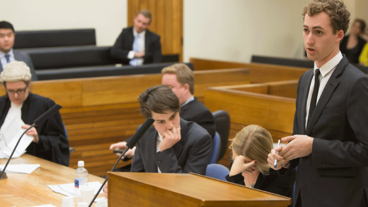 Students in a Moot law trial courtroom 