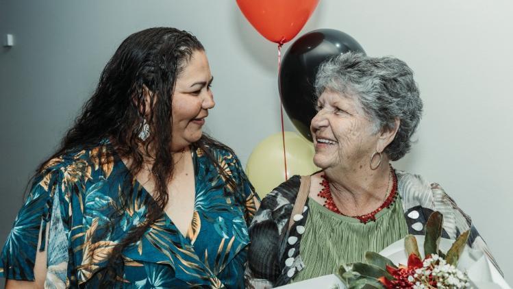 Aunty Joyce and Della smiling at the Indigenous Awards 2022