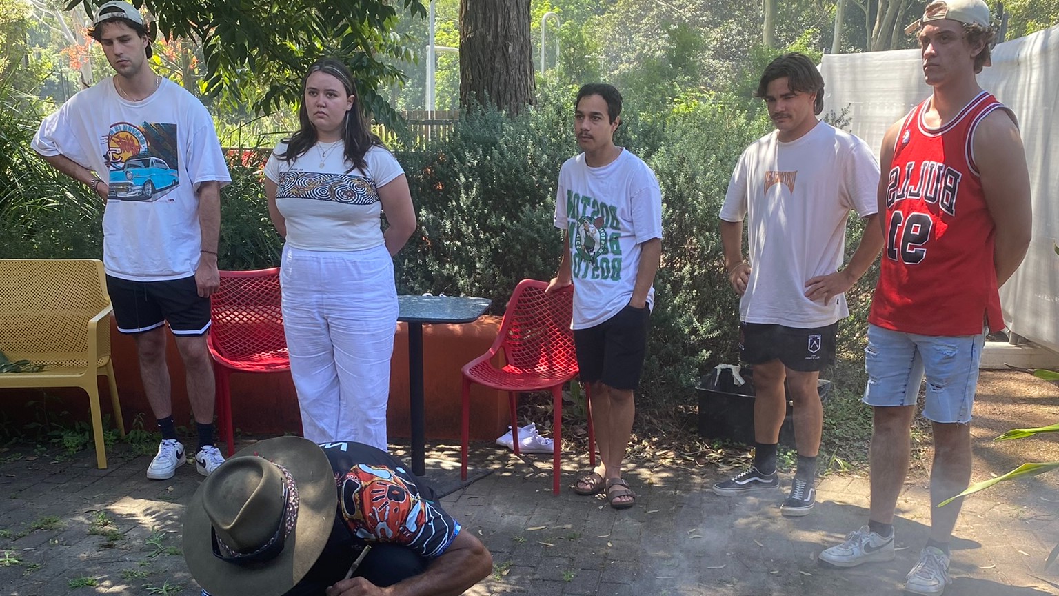 First year students participating in smoking ceremony