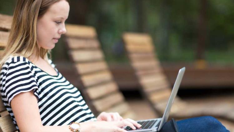 Woman working on a laptop