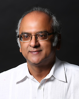 Dr Mohan Guruswamy's portrait