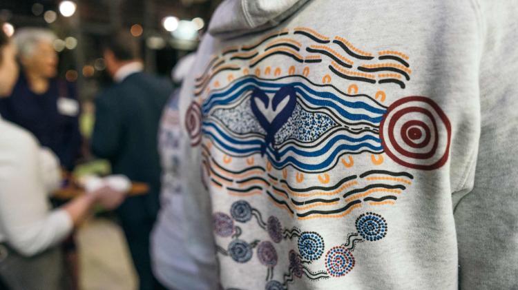 An AIME Hoodie at the UOW AIME Community Fellowship Award