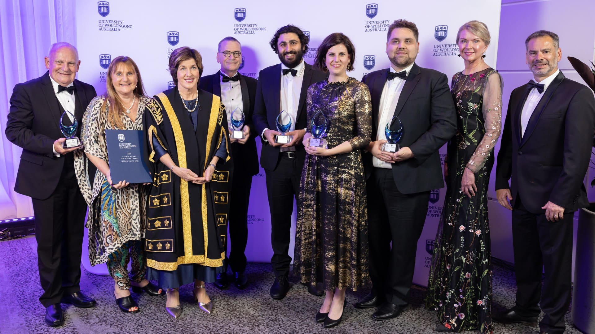 Winners of the UOW Alumni Awards stand with UOW Chancellor Christine McLoughlin. Photo: Mark Newsham