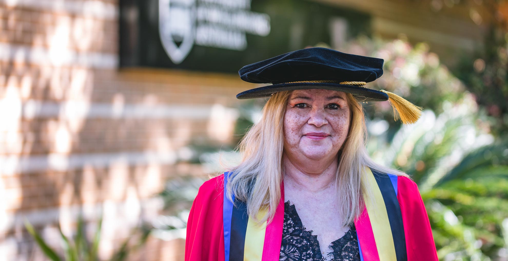 Aunty Gail Wallace receives an Honorary Doctorate from UOW. Photo: Alex Pike