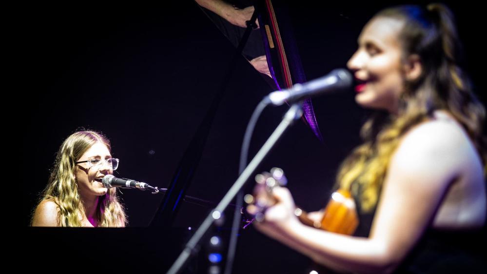 A student performs on stage during the UOW graduate music show, Triple Fret. Photo: Paul Jones