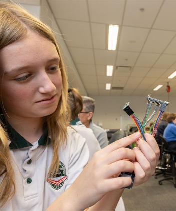 A high school student during a STEM challenge at UOW Makerspace