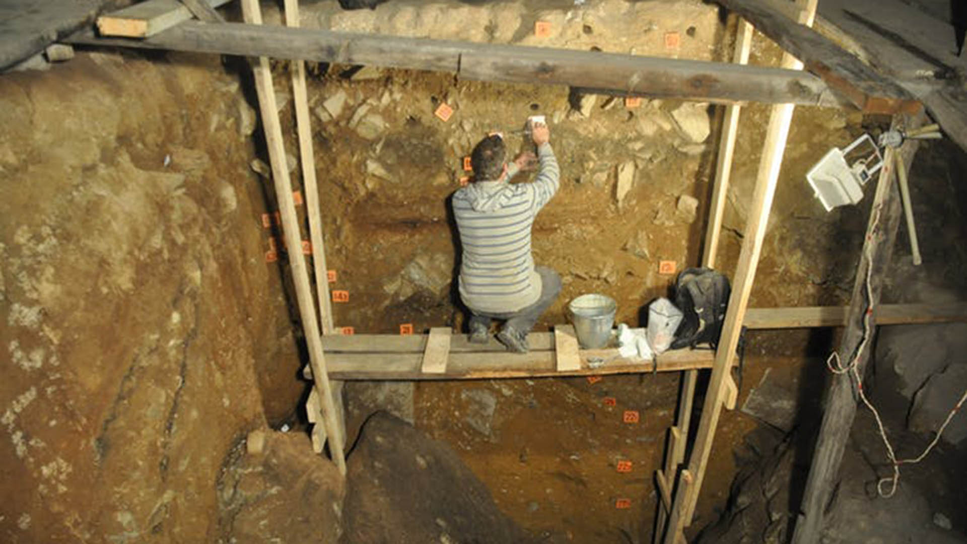 Archaeologist at work in Denisova Cave