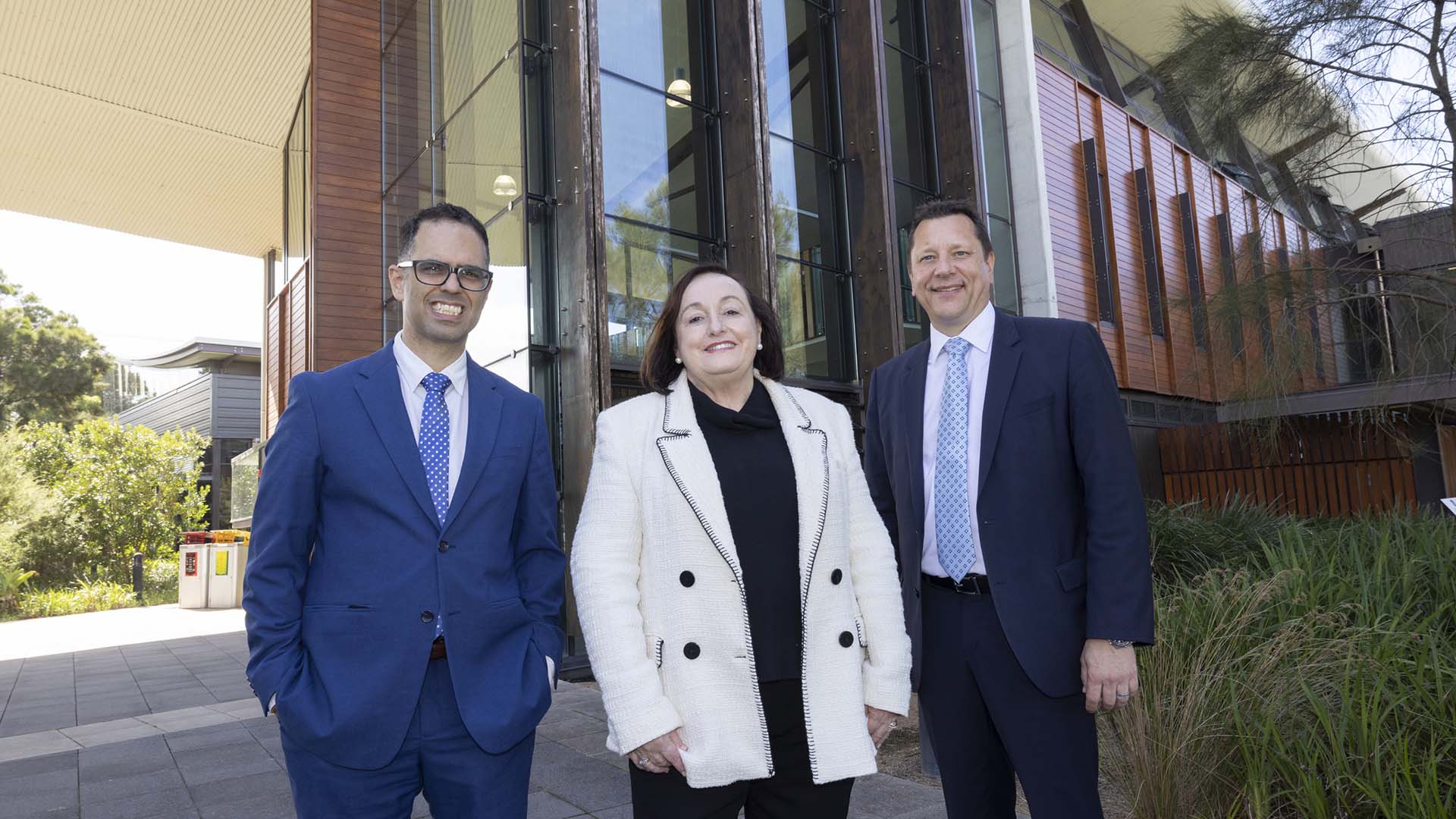 NSW Treasurer Daniel Mookhey and Planning and Public Spaces Minister Paul Scully with UOW Vice-Chancellor Professor Patricia Davidson outside the Sustainable Buildings Research Centre