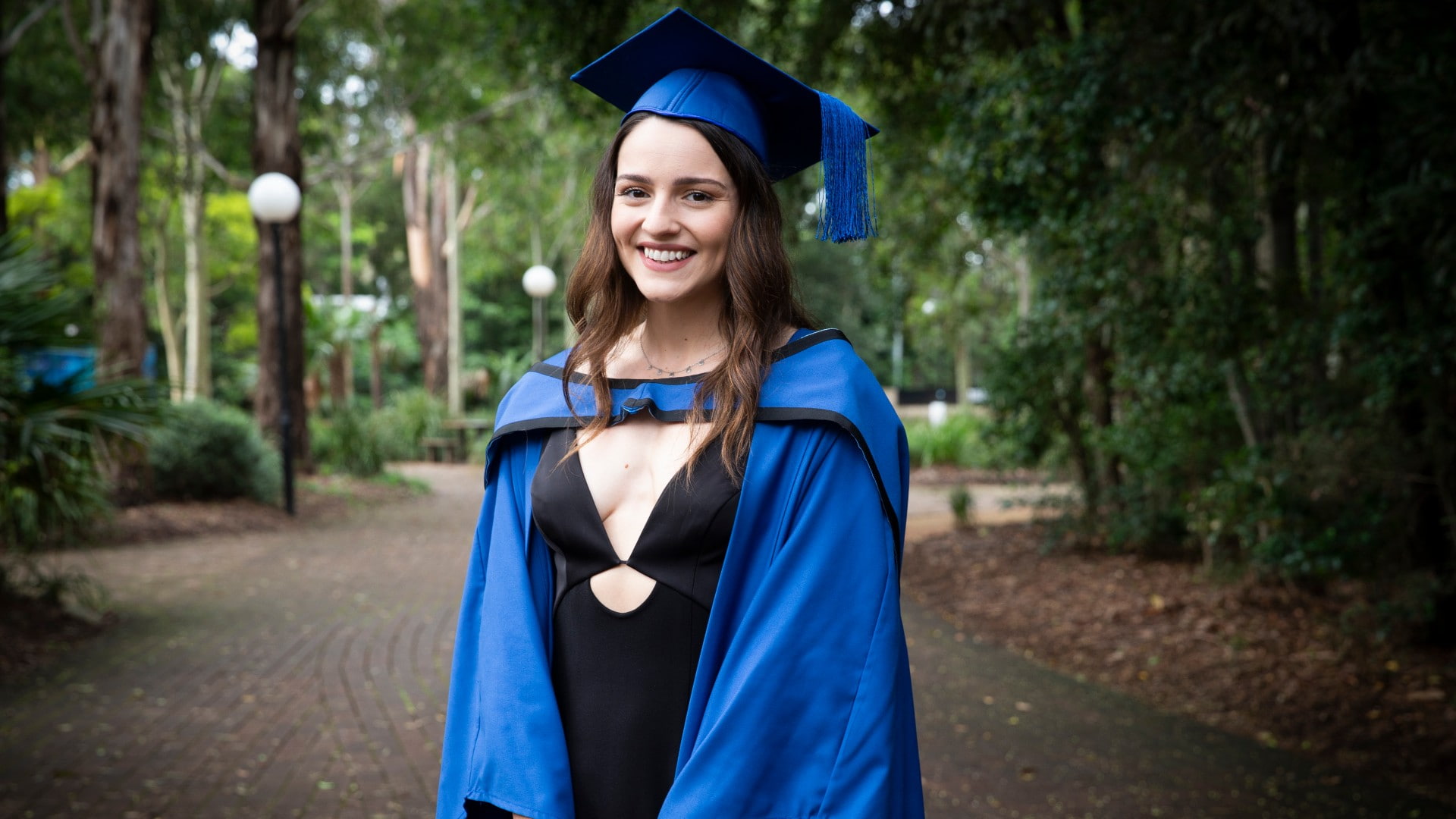 Biomedical engineering graduate Eileen Wallace in her graduation gown at UOW's Wollongong campus. Photo: Paul Jones